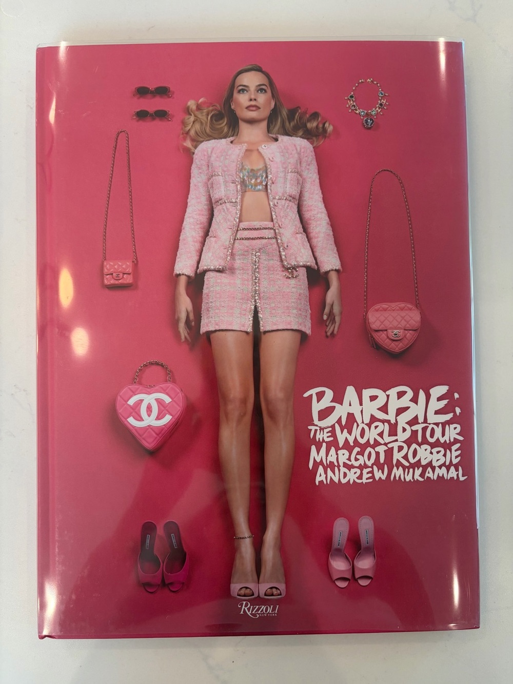 Rizzoli Barbie: The World Tour Hardcover with Pink Cover